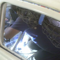 Gary welding a particularly difficult area in the car, in the tunnel.