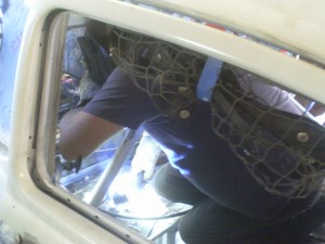 Gary welding a particularly difficult area in the car, in the tunnel.