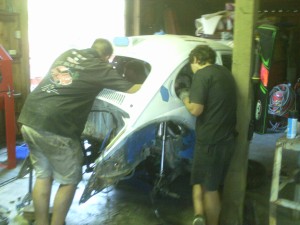 Ryan, Paul, and Gary discussing shock placement.