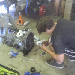 Paul putting together the tranny brackets and such. Or...texting...