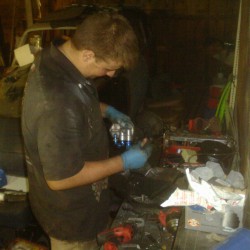 Ryan installing the fittings for the oil lines.