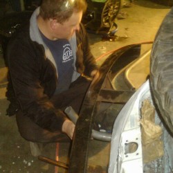 Gary fabricating the skid pan mount and bars.