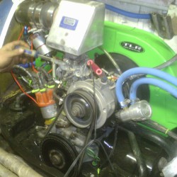 Engine being fired for the first time, and Gary adjusting the carb.