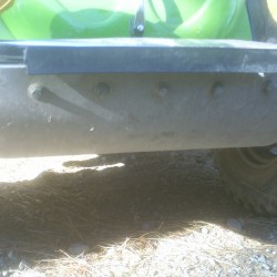 Frontal view of the front bumper. Five grade 8 bolts are used here, with two more on the tabs, and four more underneath (not including the tubed frame).